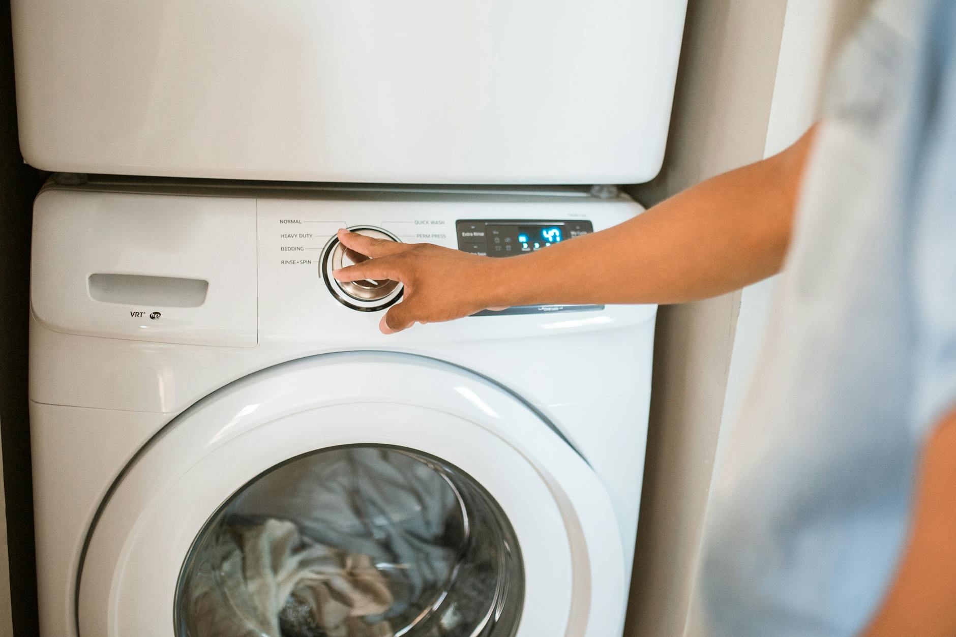 person doing laundry